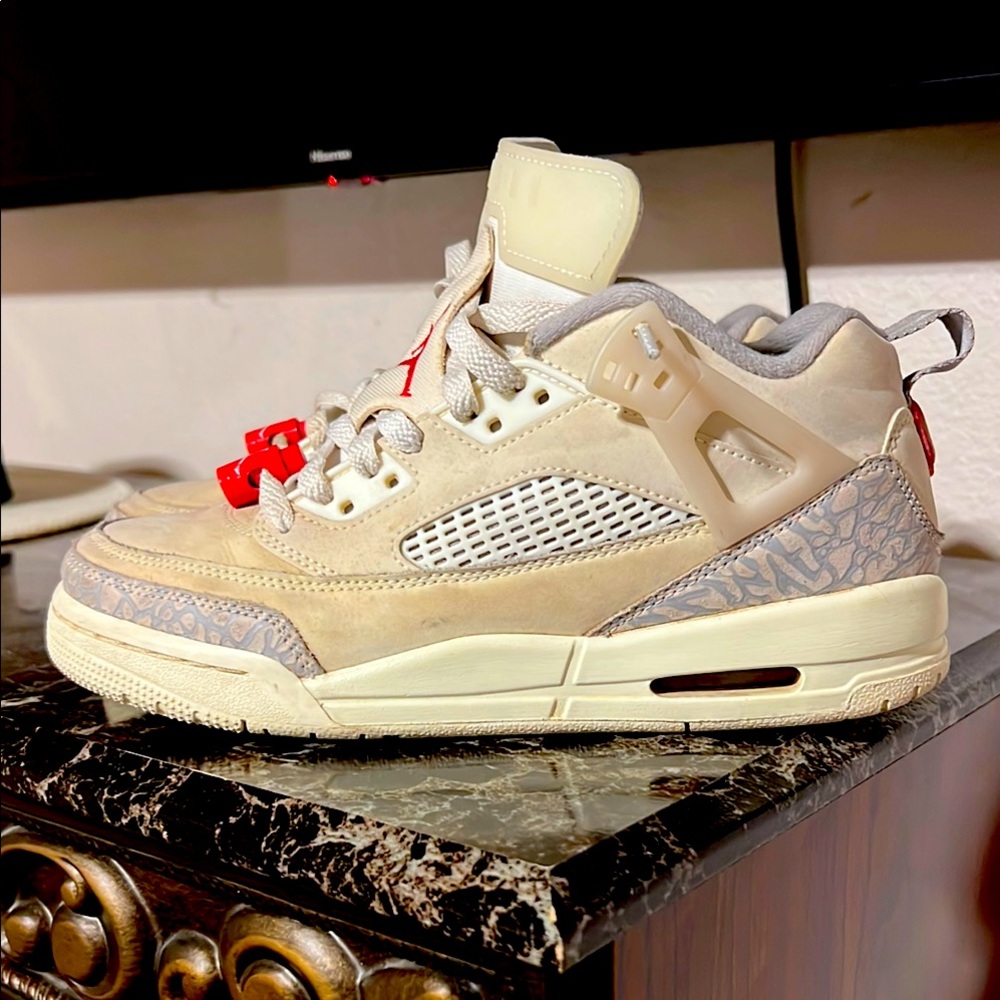 Stylish Cream and Gray Jordan Sneakers with Red Accents